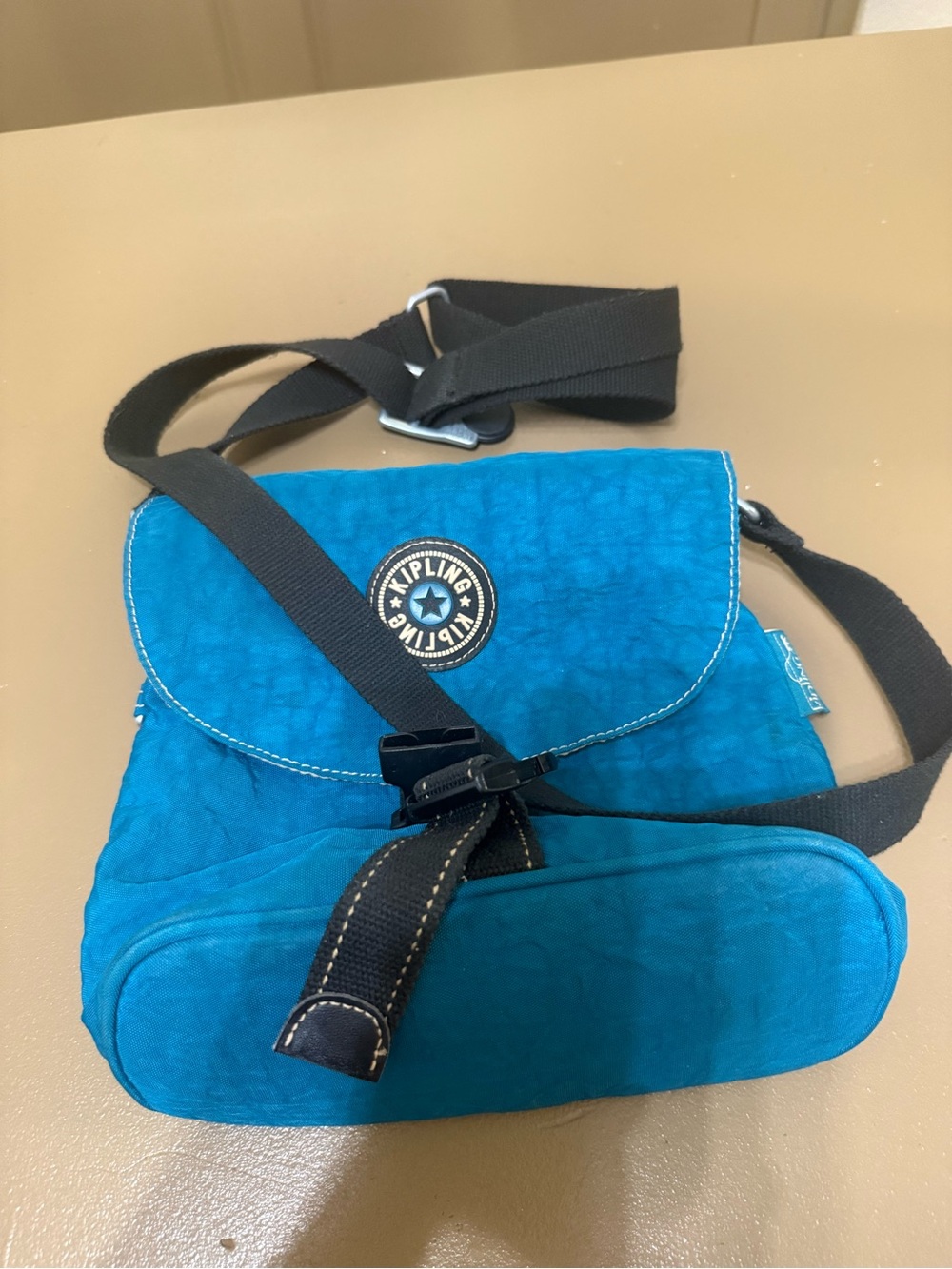 Kipling Turquoise Crossbody Bag with Black Strap
